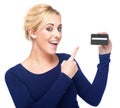 Young Woman Pointing at a Credit Card Royalty Free Stock Photo