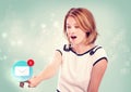 Young woman pointing at email icon Royalty Free Stock Photo