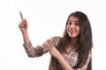 Young woman pointing fingers away Royalty Free Stock Photo