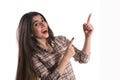 Young woman pointing fingers away Royalty Free Stock Photo