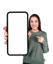 Young woman pointing at large phone blank display, isolated over Royalty Free Stock Photo