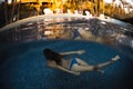 Young woman in the pool