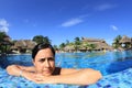 Young woman poolside Royalty Free Stock Photo