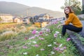 Young woman in poppy field of flowers Royalty Free Stock Photo