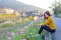 Young woman in poppy field of flowers Royalty Free Stock Photo