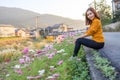 Young woman in poppy field of flowers Royalty Free Stock Photo