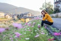 Young woman in poppy field of flowers Royalty Free Stock Photo