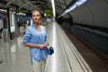 Young woman portrait inside metro subway