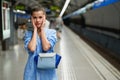 Young woman portrait inside metro subway