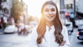 Young woman portrait look at camera in outdoors