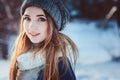 Young woman portrait walking in snowy winter forest, spending christmas vacation outdoor Royalty Free Stock Photo