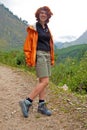 Young woman is posing against the backdrop of a beautiful view, Annapurna trekking, Nepal