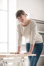 Young woman posing in her office Royalty Free Stock Photo