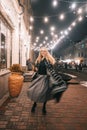 Young woman posing with a laptop on the street Royalty Free Stock Photo