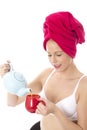 Young Woman Pouring Tea from a Teapot Royalty Free Stock Photo