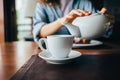 Young woman pouring tea Royalty Free Stock Photo