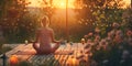 Young woman practicing breathing yoga pranayama outdoors on wooden terrace surrounded with candles, on early morning. Unity with