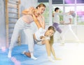 Young woman practicing wristlock with elbow blow during self defence training Royalty Free Stock Photo