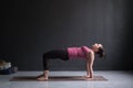 Woman practicing yoga concept, doing Purvottanasana exercise, Upward Plank pose Royalty Free Stock Photo