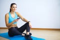 Young woman practicing yoga, doing Wild Thing, Flip-the-Dog exercise, Camatkarasana pose, working out, wearing sportswear, black Royalty Free Stock Photo