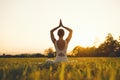 Young woman practicing yoga on nature Royalty Free Stock Photo