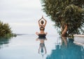 Young woman practicing yoga outdoors. Meditation balance relaxation concept