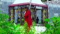 Young woman praying in a temple