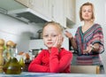 Young woman preaching little daughter