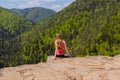 Young woman on the precipice