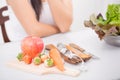 Young woman preferring food