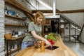 Young woman preparing food in the rustic kitchen Royalty Free Stock Photo