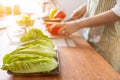 young woman preparing lettuce As an ingredient in breakfast menu and ready for cooking healthy meals and on table there are also Royalty Free Stock Photo