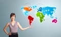 Young woman presenting colorful world map