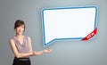 Young woman presenting modern speech bubble copy space