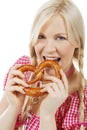 Young woman with pretzel Royalty Free Stock Photo
