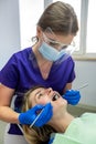 young woman with problem teeth came to the dentist to treat teeth.