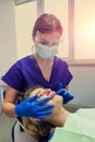 young woman with problem teeth came to the dentist to treat teeth.