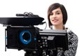 Young woman with professional video camera, SLR, on white Royalty Free Stock Photo