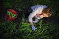 Young woman pulling weeds Royalty Free Stock Photo
