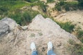 Young woman reaching the top of a mountain. Royalty Free Stock Photo