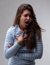 Young woman reacting with abhorrence Royalty Free Stock Photo