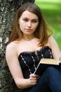 Young woman reading a book. Royalty Free Stock Photo