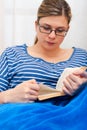 Young woman reading book Royalty Free Stock Photo