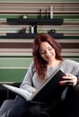 Young woman reading a book