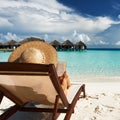 Young woman reading a book at beach Royalty Free Stock Photo