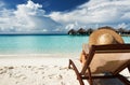 Young woman reading a book at beach Royalty Free Stock Photo