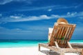 Young woman reading a book at beach Royalty Free Stock Photo