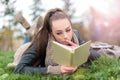 Young woman reading book Royalty Free Stock Photo