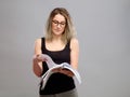 Young woman is reading a book Royalty Free Stock Photo