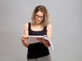 Young woman is reading a book Royalty Free Stock Photo